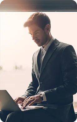 Business professional working on a laptop
