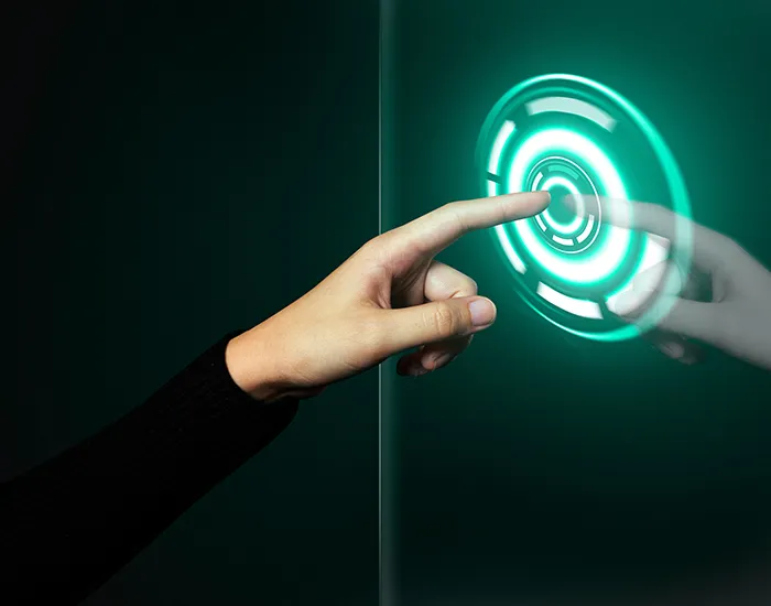 Hand touching a glowing digital interface, representing RixDigi's vision for AI-driven business